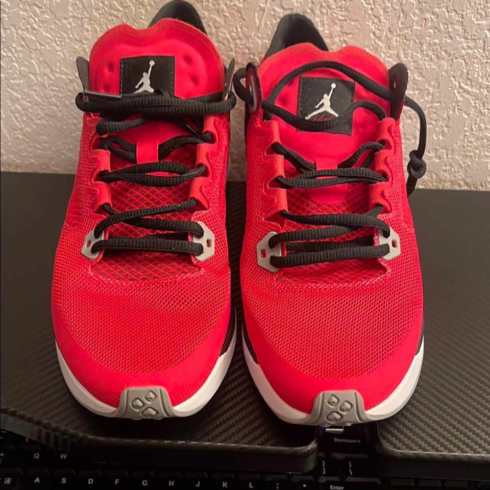 Jordan Red and Black Athletic Shoes with Jumpman Logo